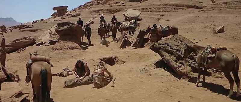 Hurry up, Besh! Cover him with some rocks and Iet's go