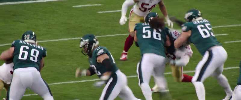 Hurts gives it off, gets it... into the end zone