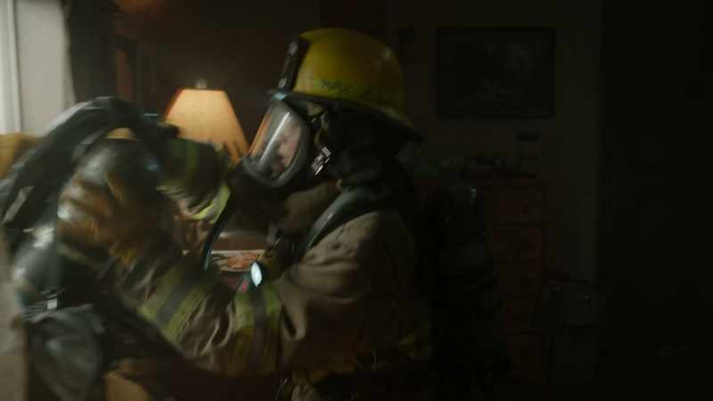 I got an SCBA en route. Put it on the kid and come down now