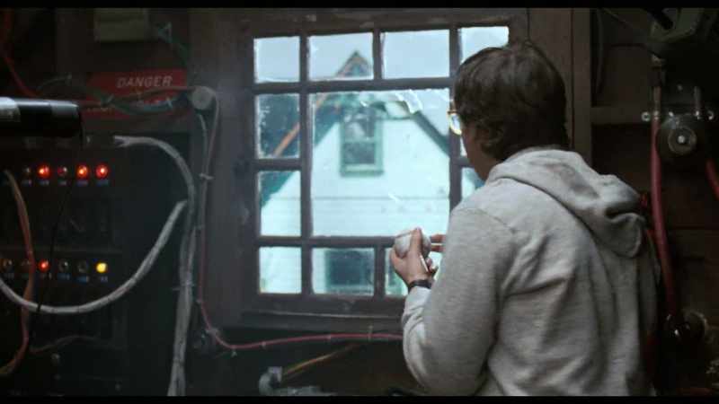 I got it. The ball came through the window and activated the machine