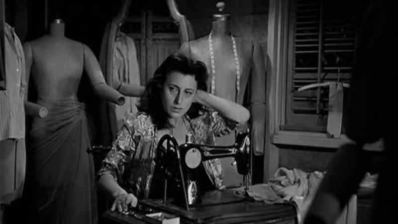 I hear the sewing machine. She's working