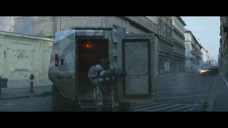 [heavy door opening]