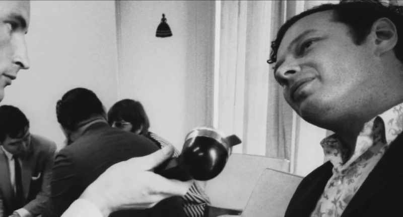 I knock, and there is Brian Epstein in a bathrobe, sweating