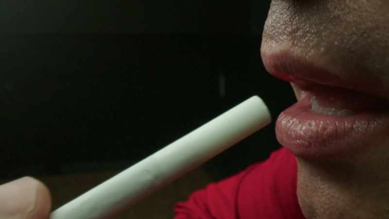 I put a cigarette in his mouth