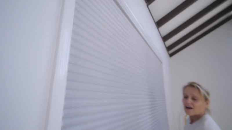 I removed the vertical blinds from the high windows altogether