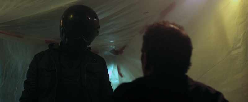 I see an angry boy hiding in a mask