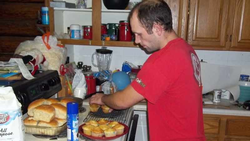 I see him standing in my kitchen cooking