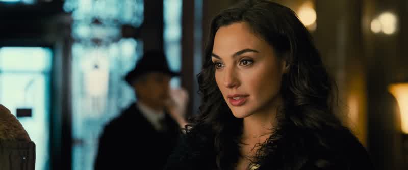 I'm introducing myself It's Etta CandyI'm Steve Trevor's secretaryWhat is a secretaryOoh Well I do everythingI go where he tells me to go and I do what he tells me to doWell where I'm from that's