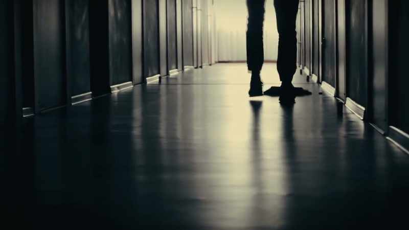 In a modest local hospital, a young orderly begins his shift