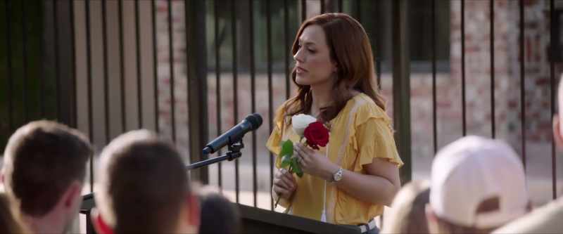 In my hand, I hold two roses