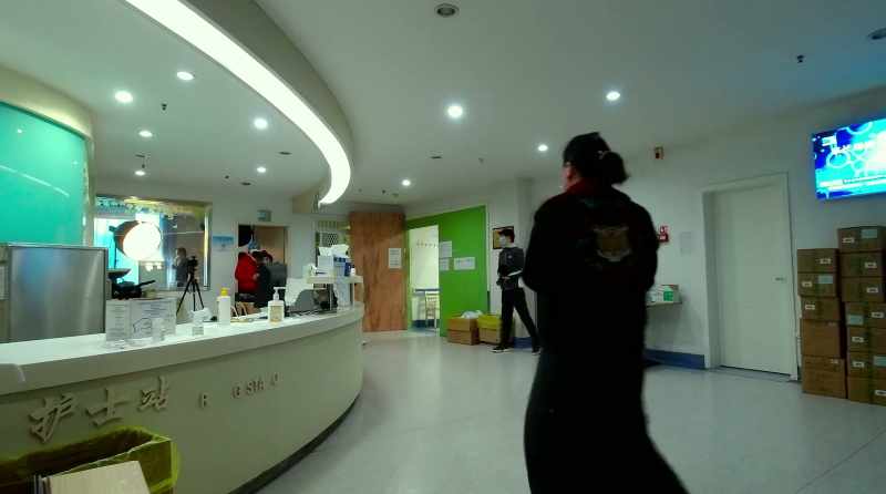 In one moment captured by a camera placed in the lobby