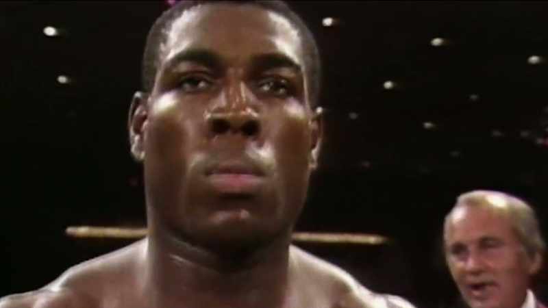 In the blue corner, the challenger, Frank Bruno!