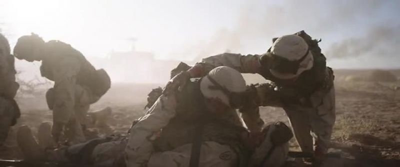 In the dust, I could see the man's face