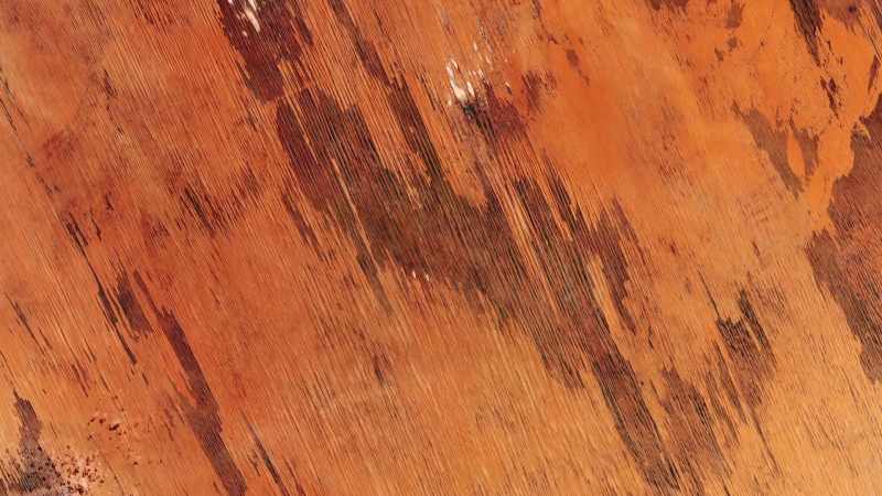 In the surface are lines carved by winds over millennia