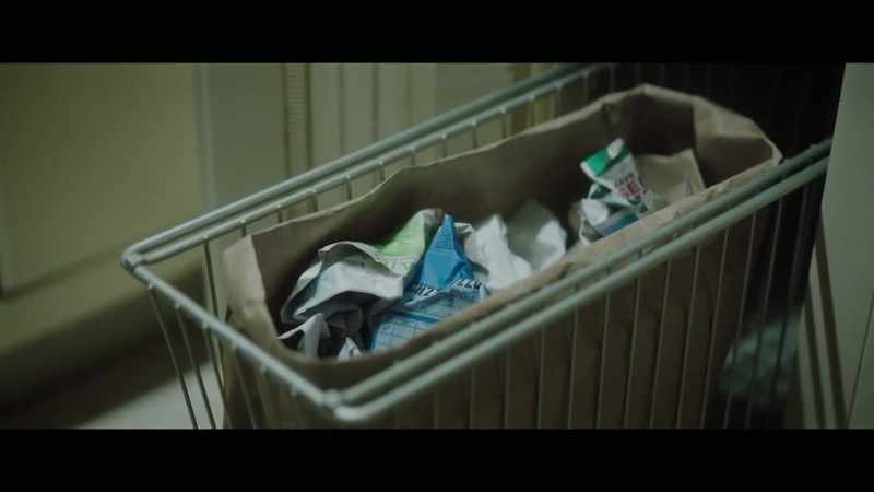 In the trash can in the kitchen