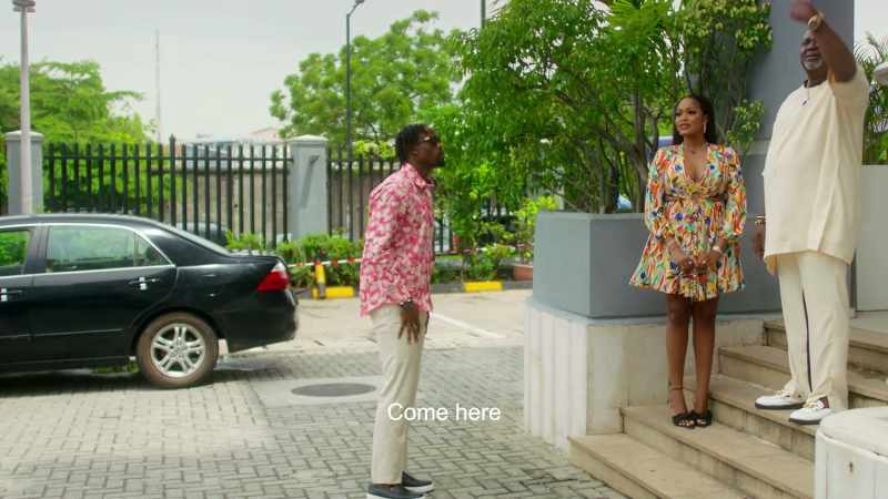[in Yoruba, scoffs] Uh… Come here