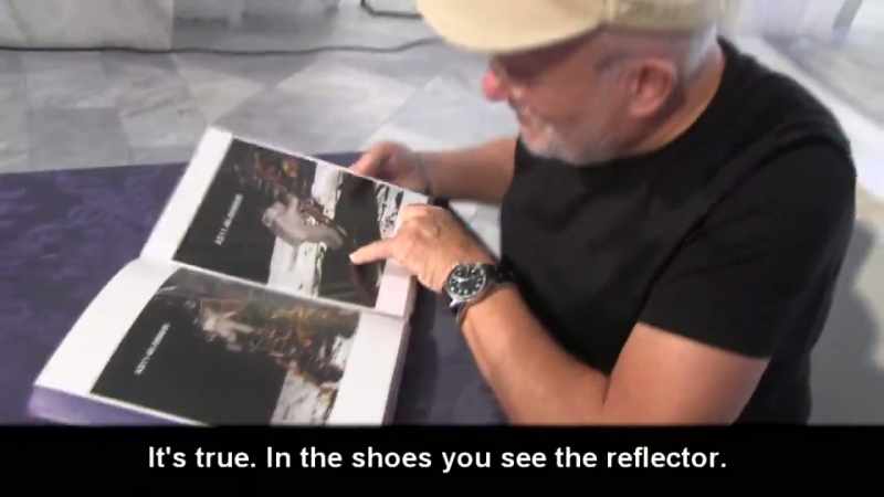 Indeed, you can see a reflection on the boots
