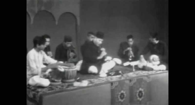 [Indian music playing]