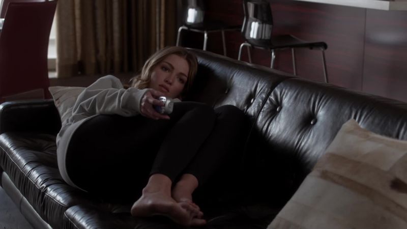 [indistinct chatter on TV]