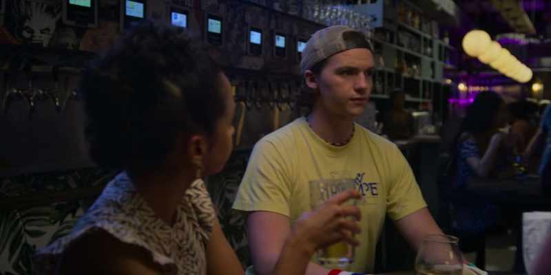 [indistinct conversations in the bar]