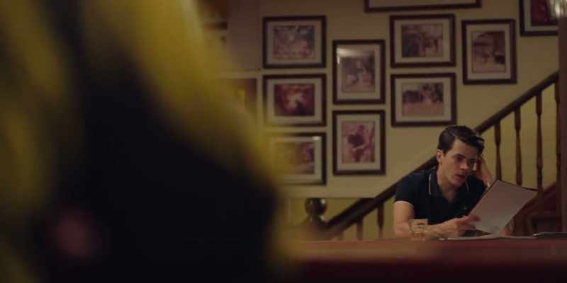 [Indistinct conversations, music playing in background]