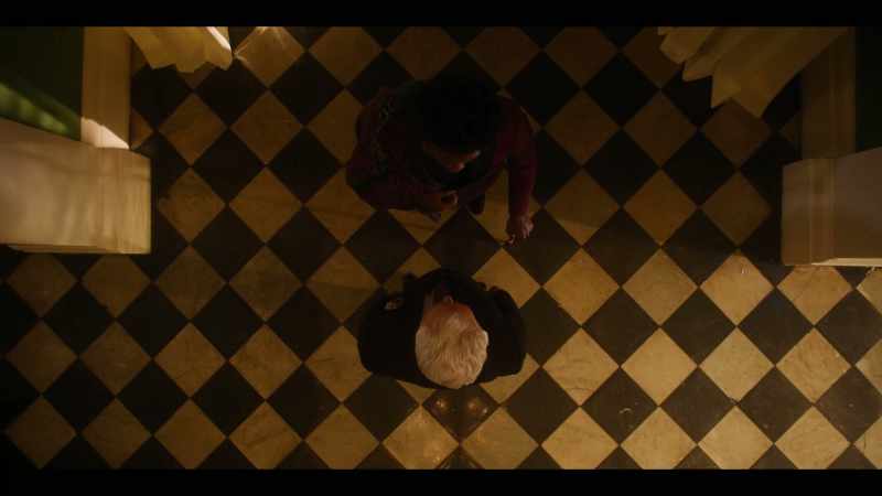 [Indistinct conversations, piano playing classical music]