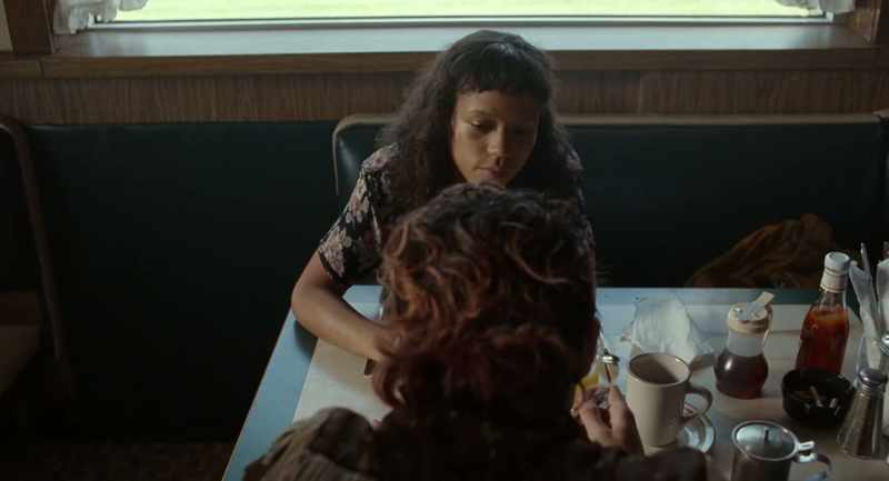 [indistinct TV chatter]