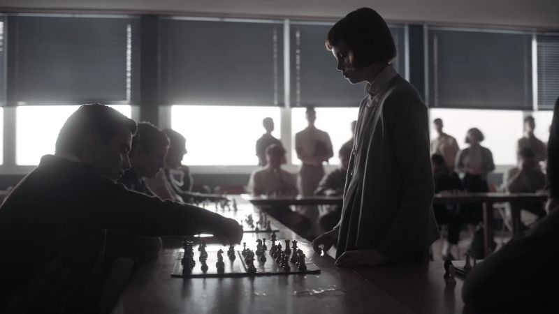 [indistinct whispering]