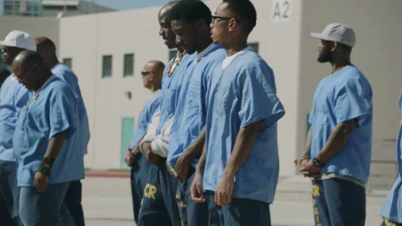 (inmates chattering)