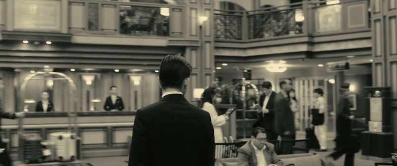 Inside a hotel, there are people everywhere