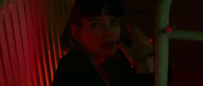 (intercom blares)