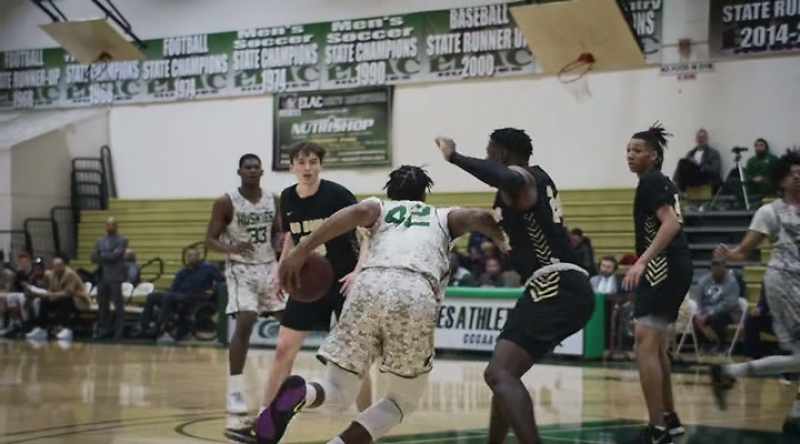 Into the front court for East LA. Hampton, aggressive move there