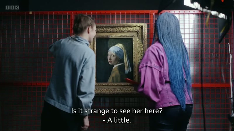 Is it strange to see her here? - A little