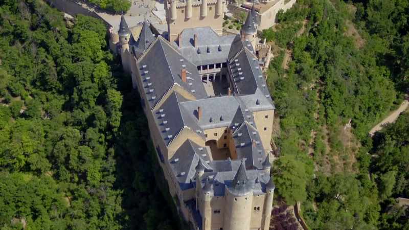 It has 12 conical spires clad in slate