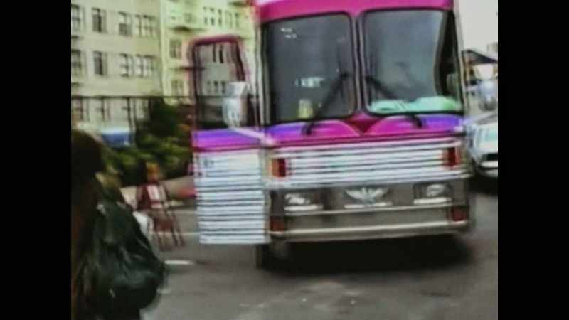 It was a pink bus and it had a tilted champagne glass