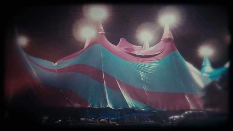 It is late a night, around the carnival somewhere