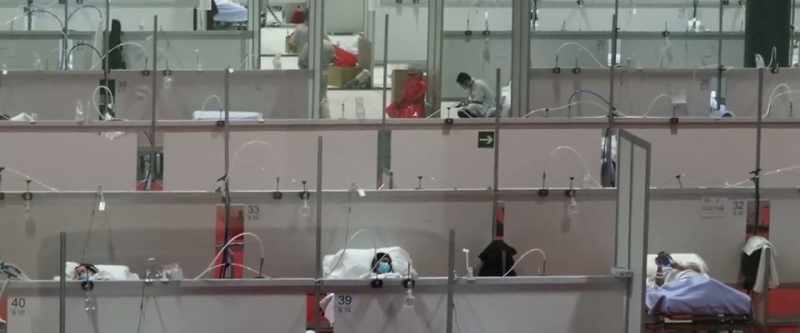 It means makeshift hospitals like this one in Madrid