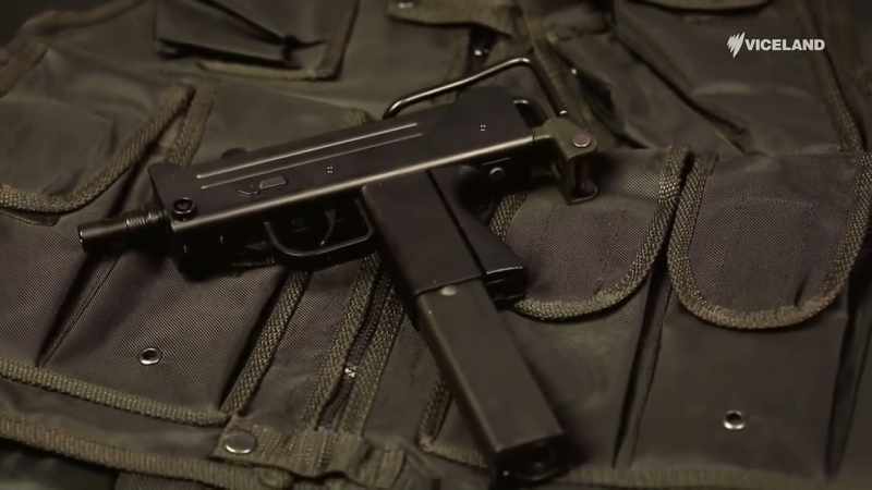 It uses an open-bolt, blowback-operated design