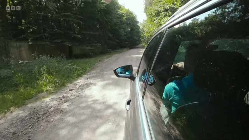 It's a dirt track. And now we're in forest