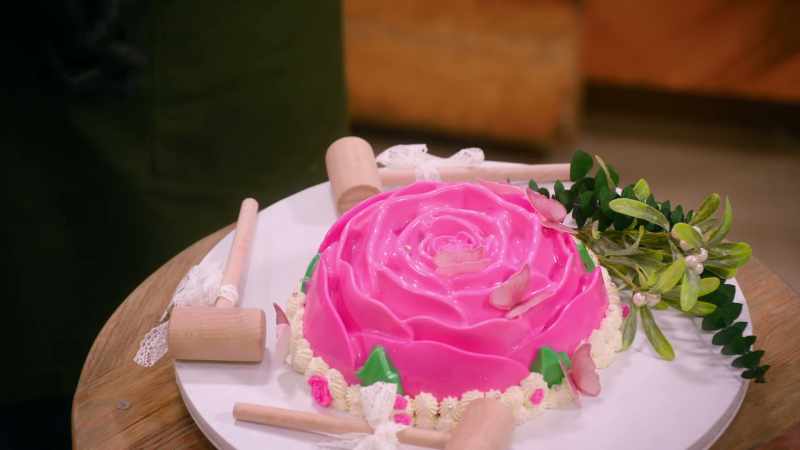 It's a white chocolate rose, and she represents