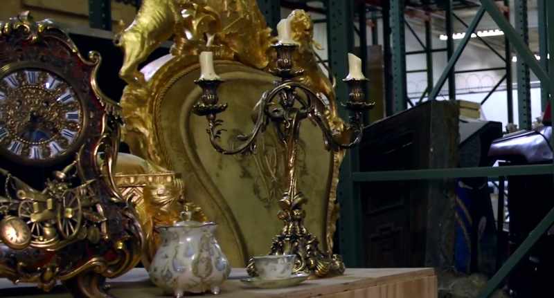 It's Cogsworth and Lumiere