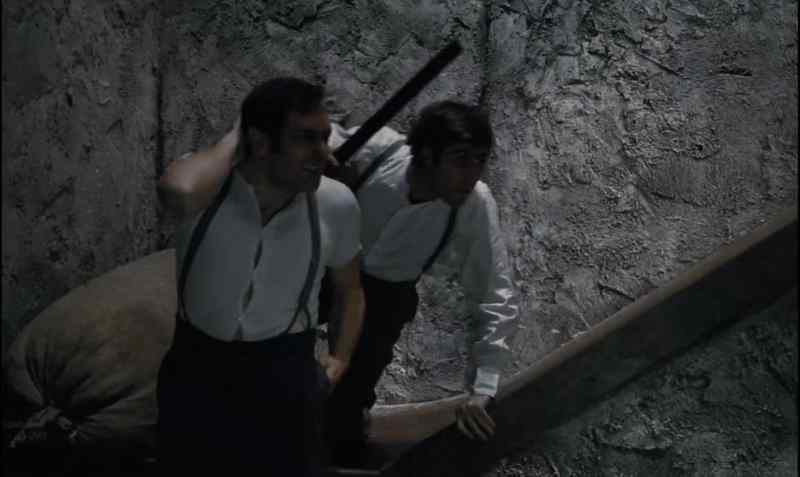 It's jammed. Quickly. Down the stairs