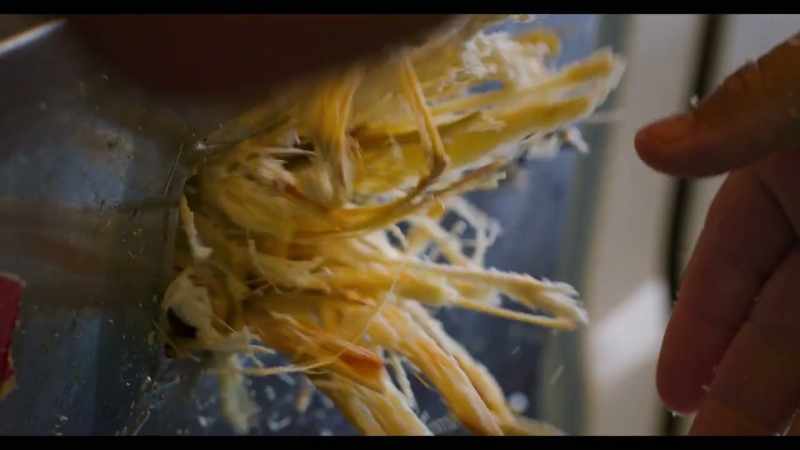 It's made by distilling fermented sugarcane juice