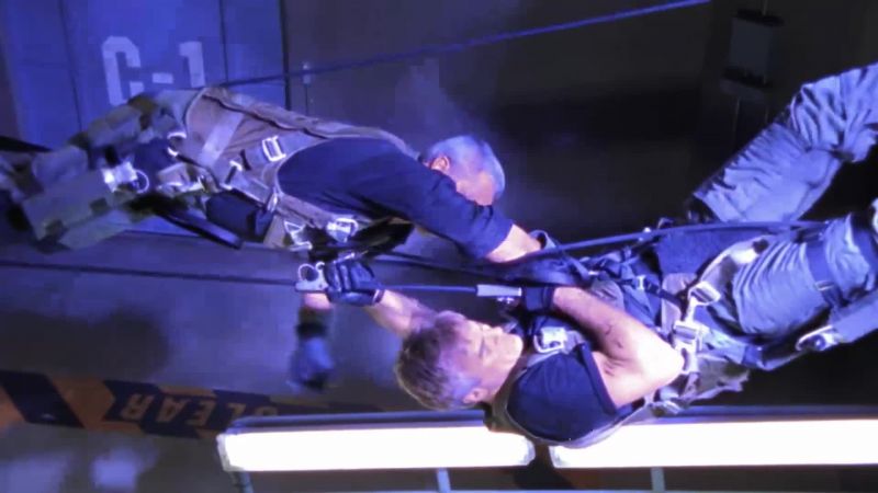 I've got you! - Get up there and arm that damn bomb!