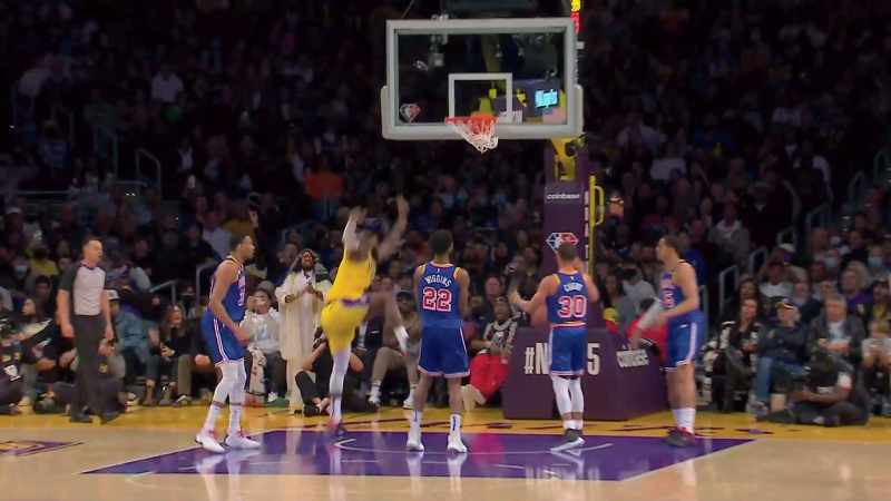 James sees an opening. Drives inside and the flush