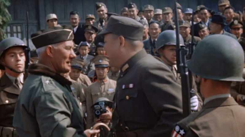 JAPANESE TROOPS DISSOLVE INTO THE JUNGLE