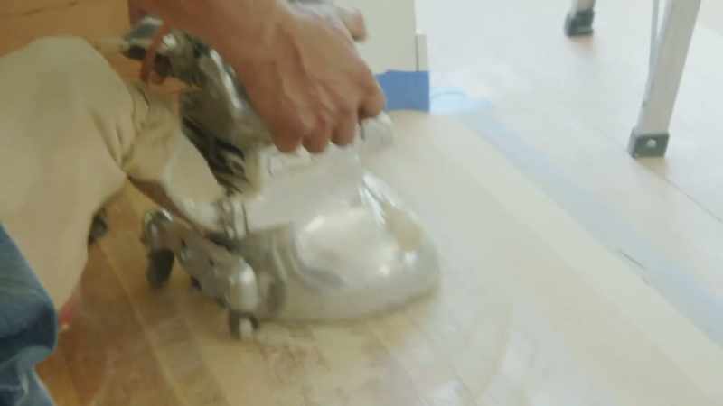 [Jasmine] The hardwood floors are being sanded