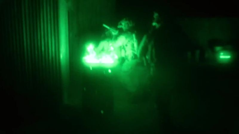 JASON: This is Bravo 1. Entering prisoners' barracks