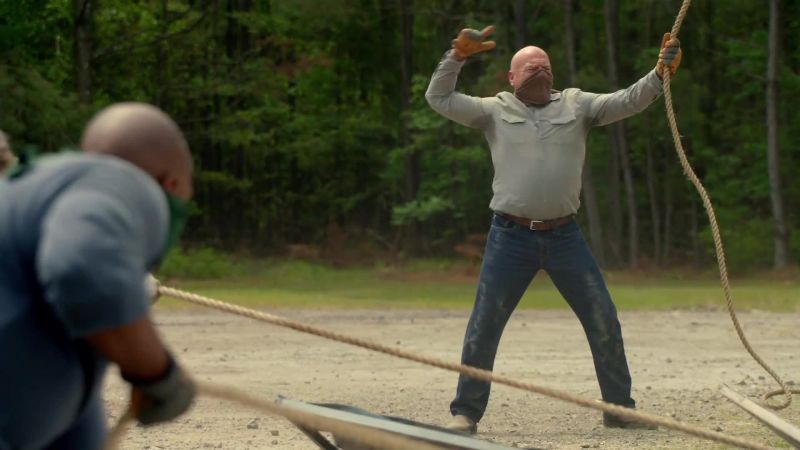 Jim: All right, let's hoist it on three. One, two, three