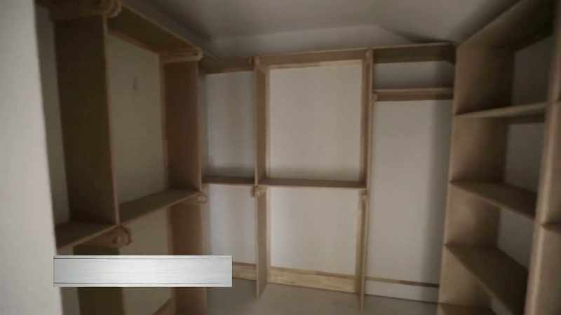 (Joanna) We were able to give the Scrivanos a master closet